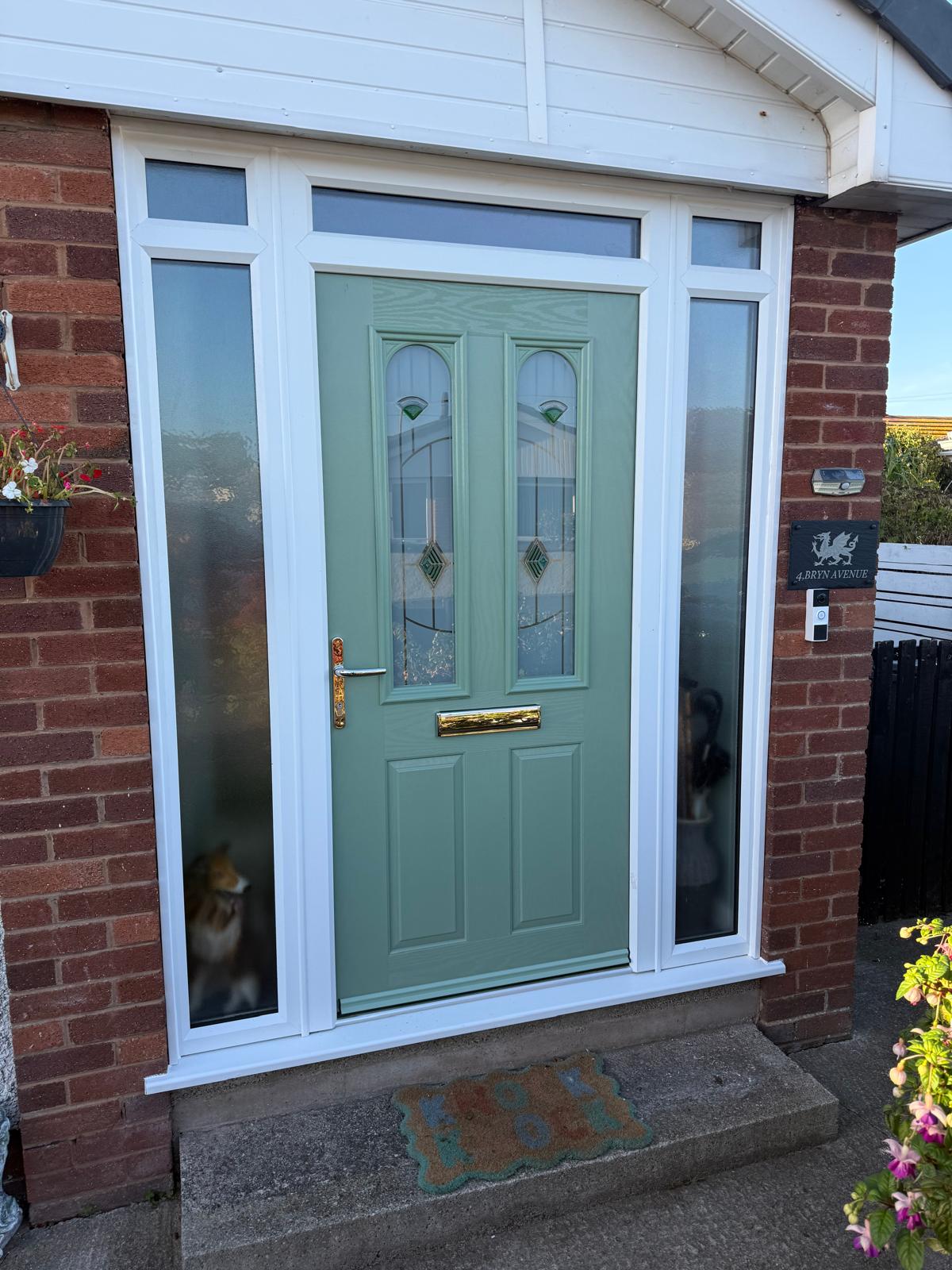 Completed green front door installation in Kinmel Bay, North Wales