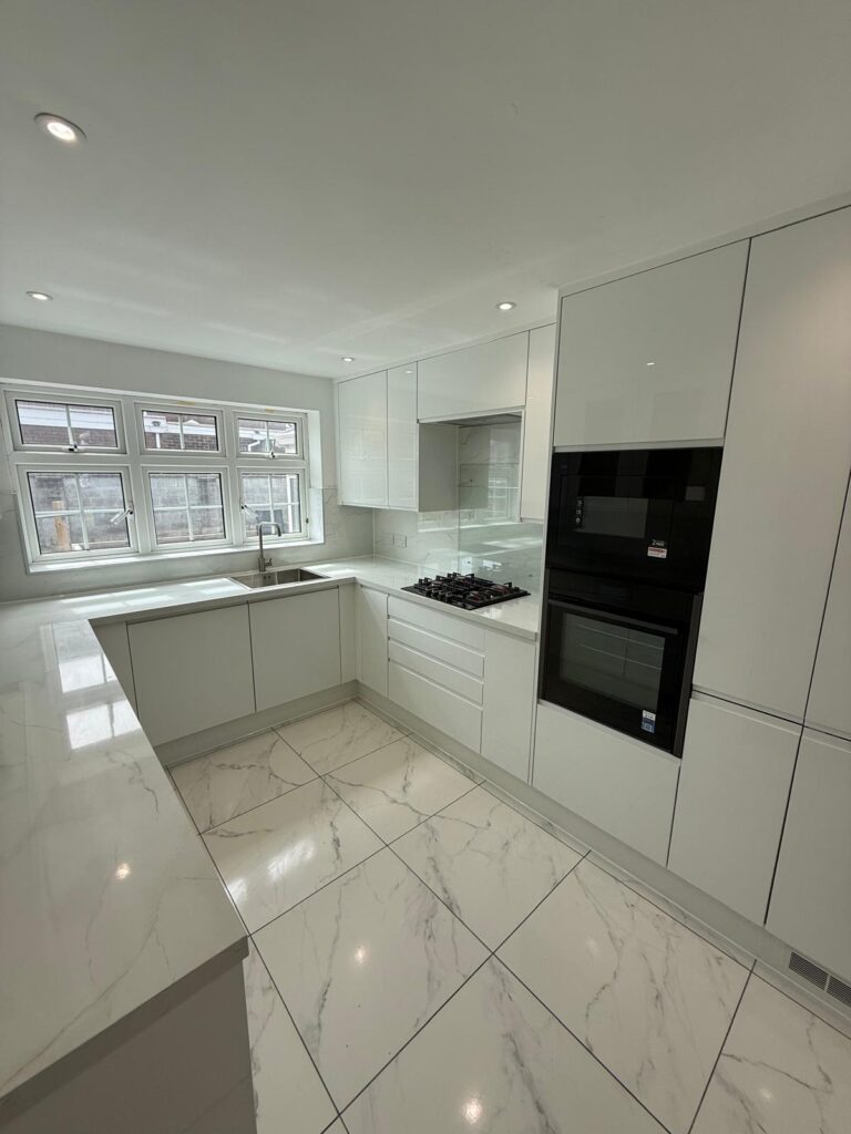Finished white kitchen with pale tiled floor - Fully Integrated Kitchen in Rhyl North Wales